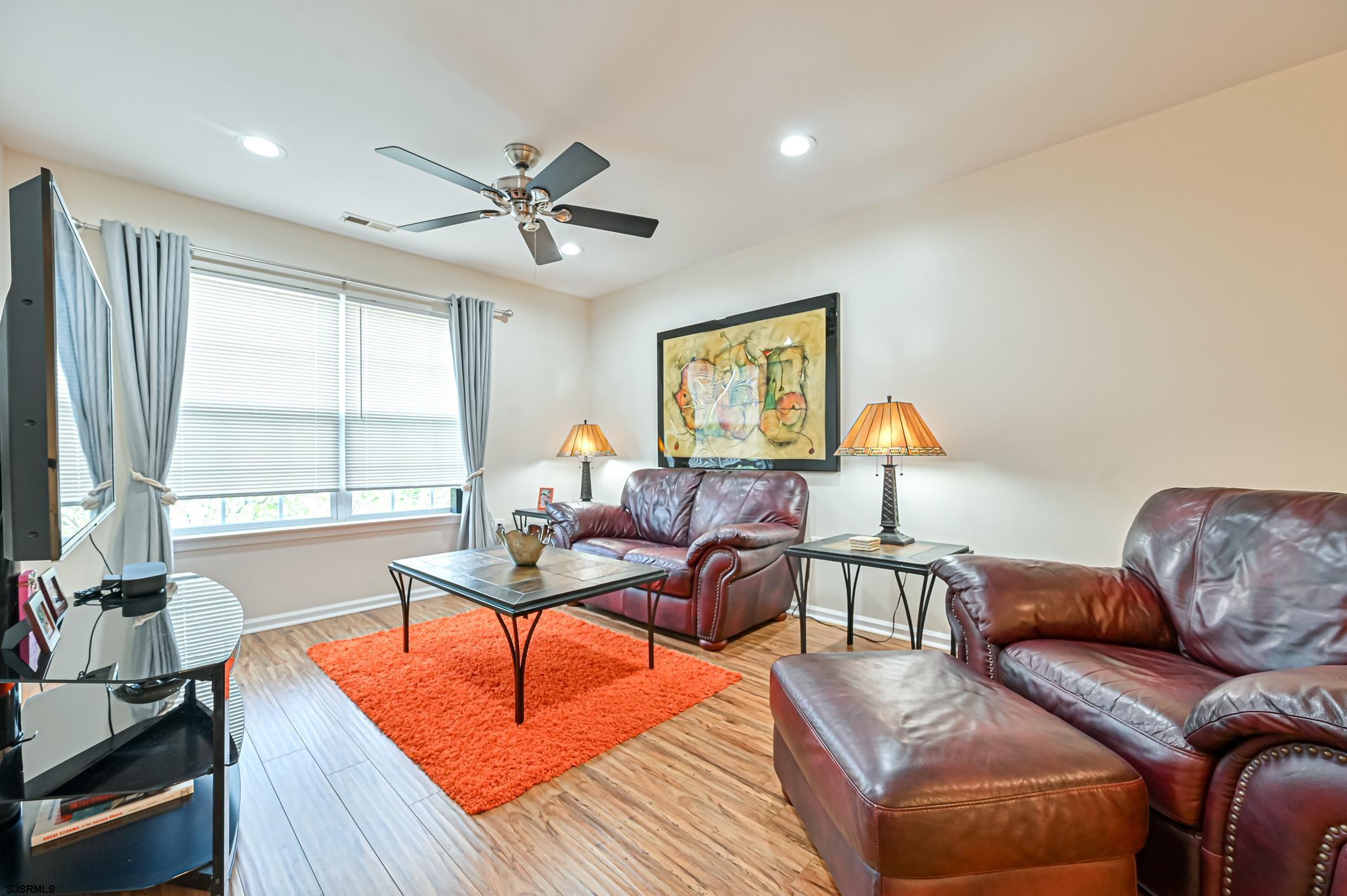27 Ables Run Drive Absecon, NJ 08201 - Photo 20 of 28 a living room with furniture and a large window