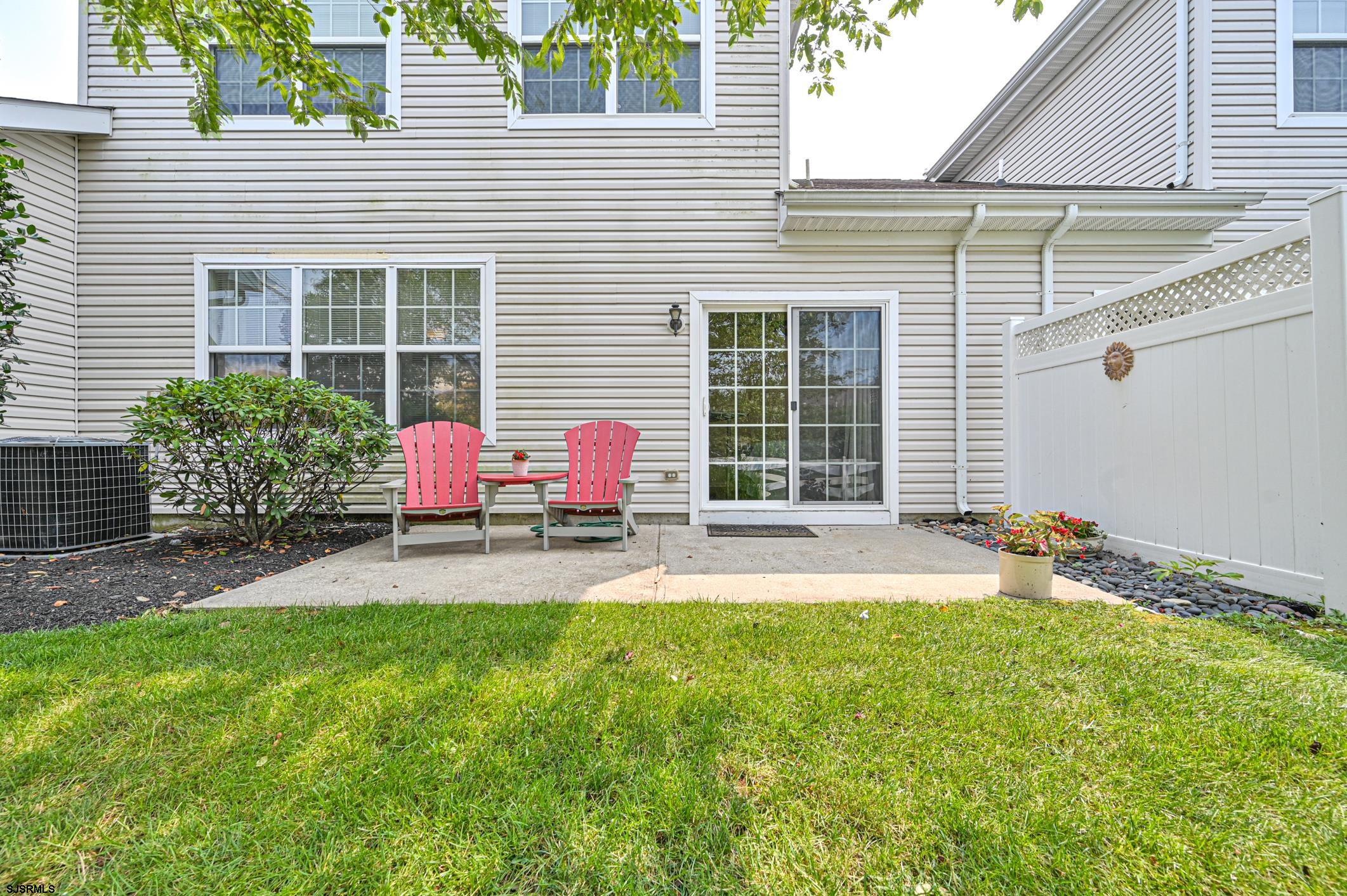 27 Ables Run Drive Absecon, NJ 08201 - Photo 26 of 28 a backyard of a house with seating space