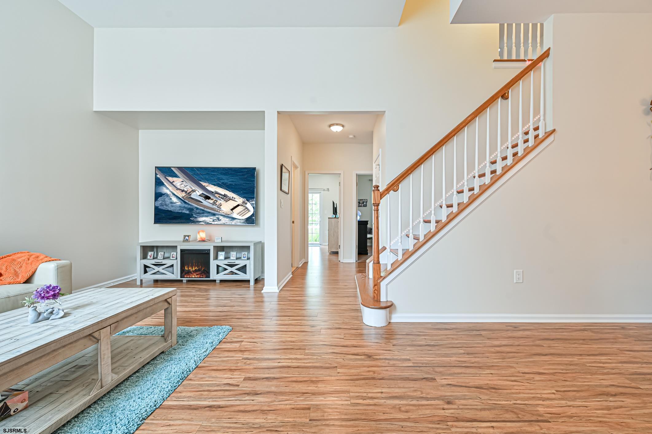 27 Ables Run Drive Absecon, NJ 08201 - Photo 6 of 28 a view of entryway and hall with wooden floor