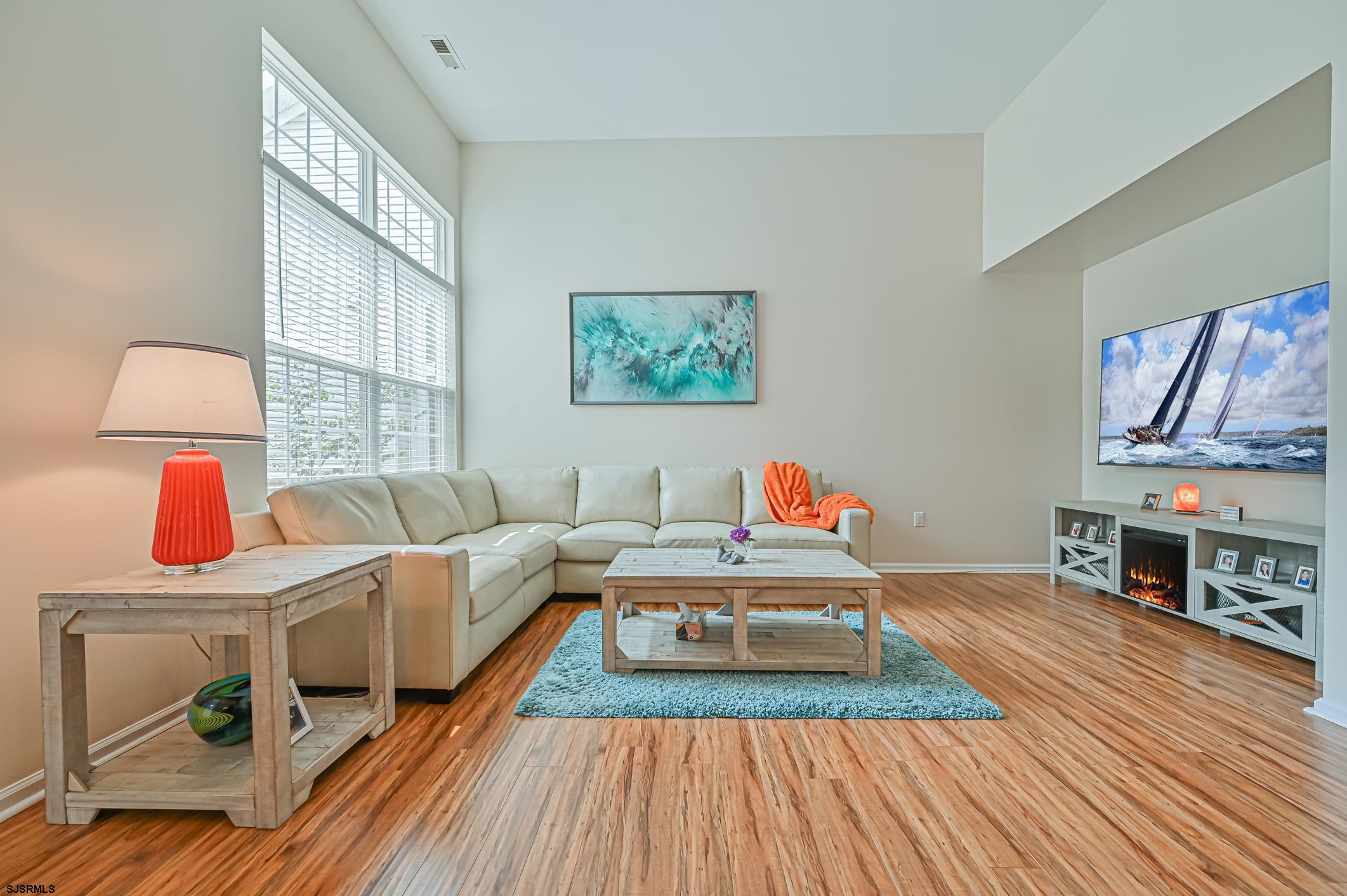 27 Ables Run Drive Absecon, NJ 08201 - Photo 7 of 28 a living room with furniture and a wooden floor