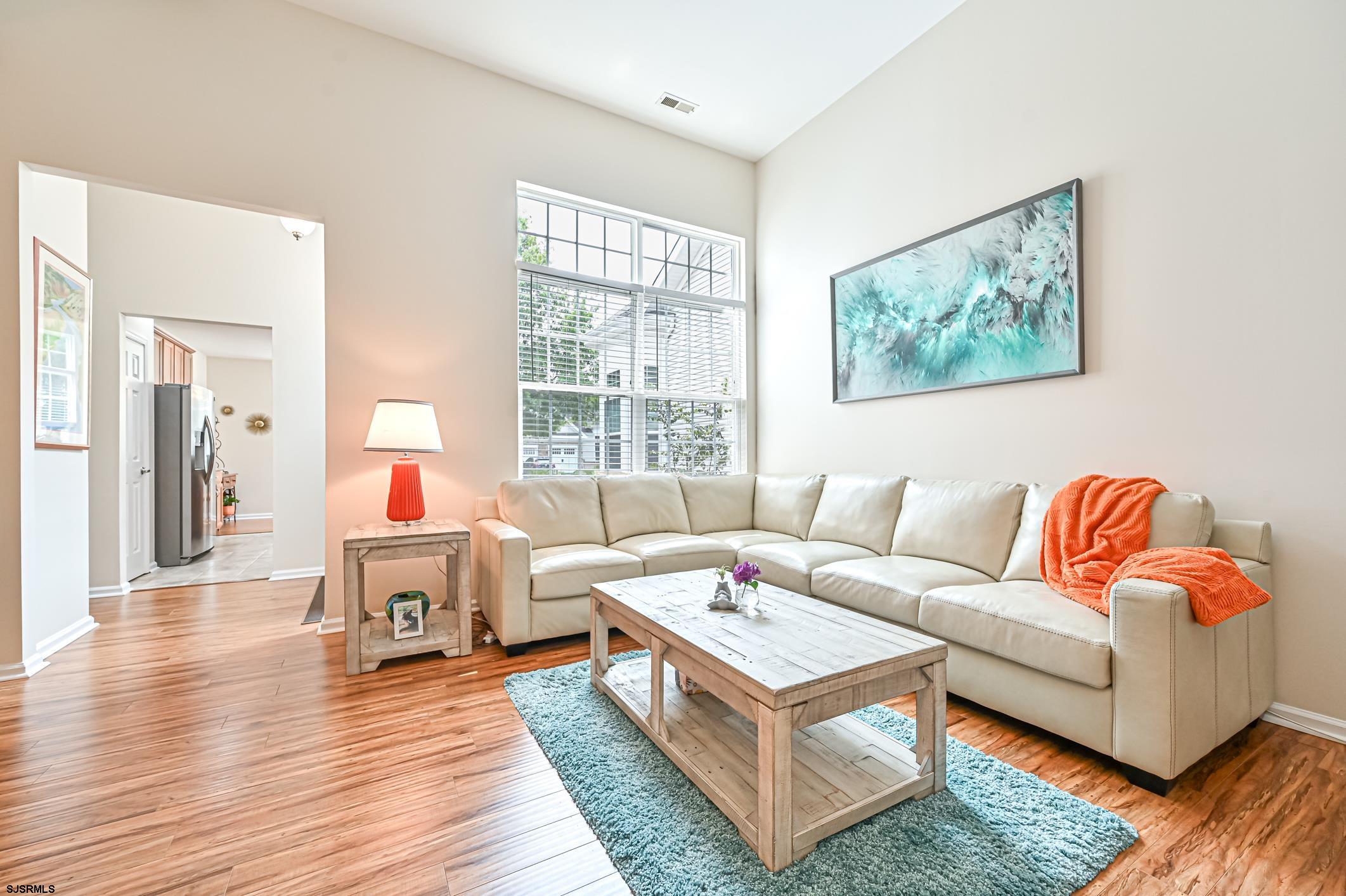 27 Ables Run Drive Absecon, NJ 08201 - Photo 8 of 28 a living room with furniture and a wooden floor
