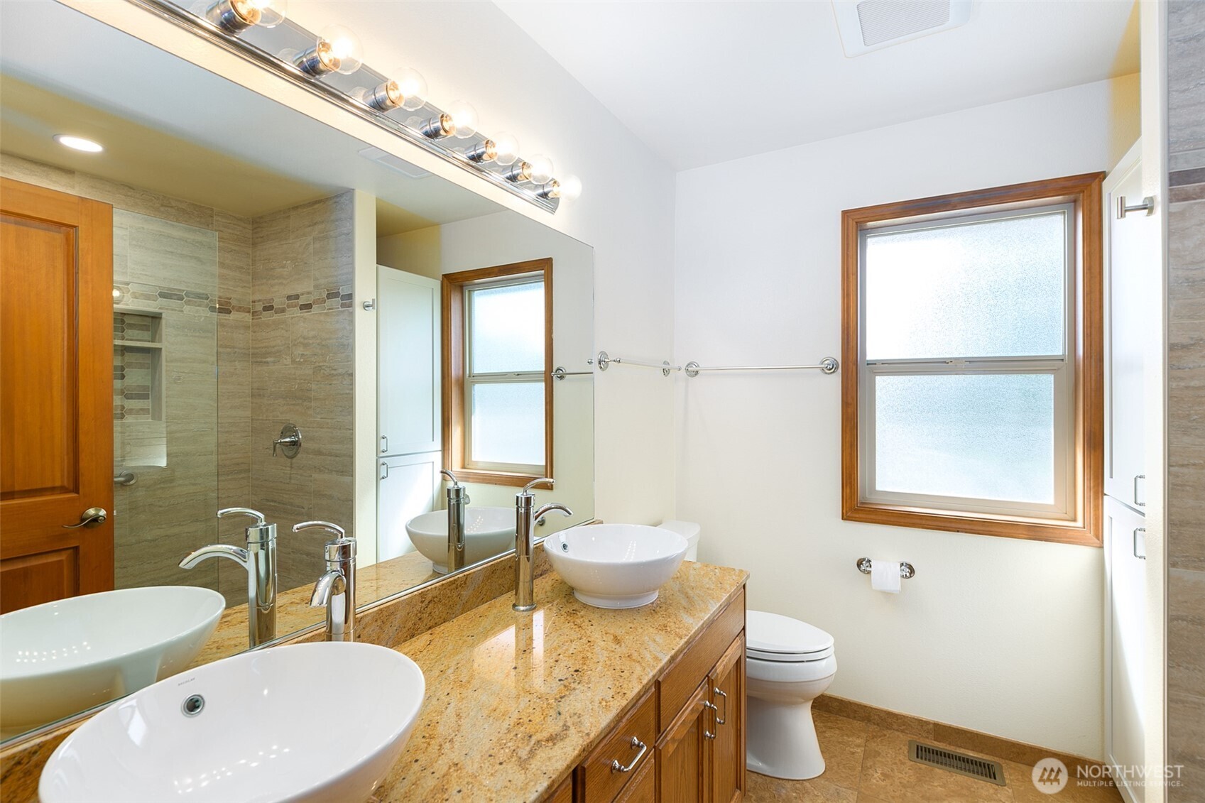 81 Bon Jon View Way Sequim, WA 98382 - Photo 32 of 38 a bathroom with a granite countertop double vanity sink a mirror and a toilet