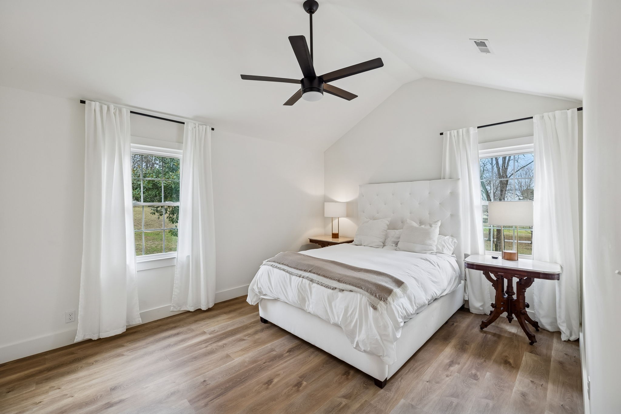 670 North Ridge Road Columbia, TN 38401 - Photo 15 of 45 a bedroom with a bed a window and a mirror