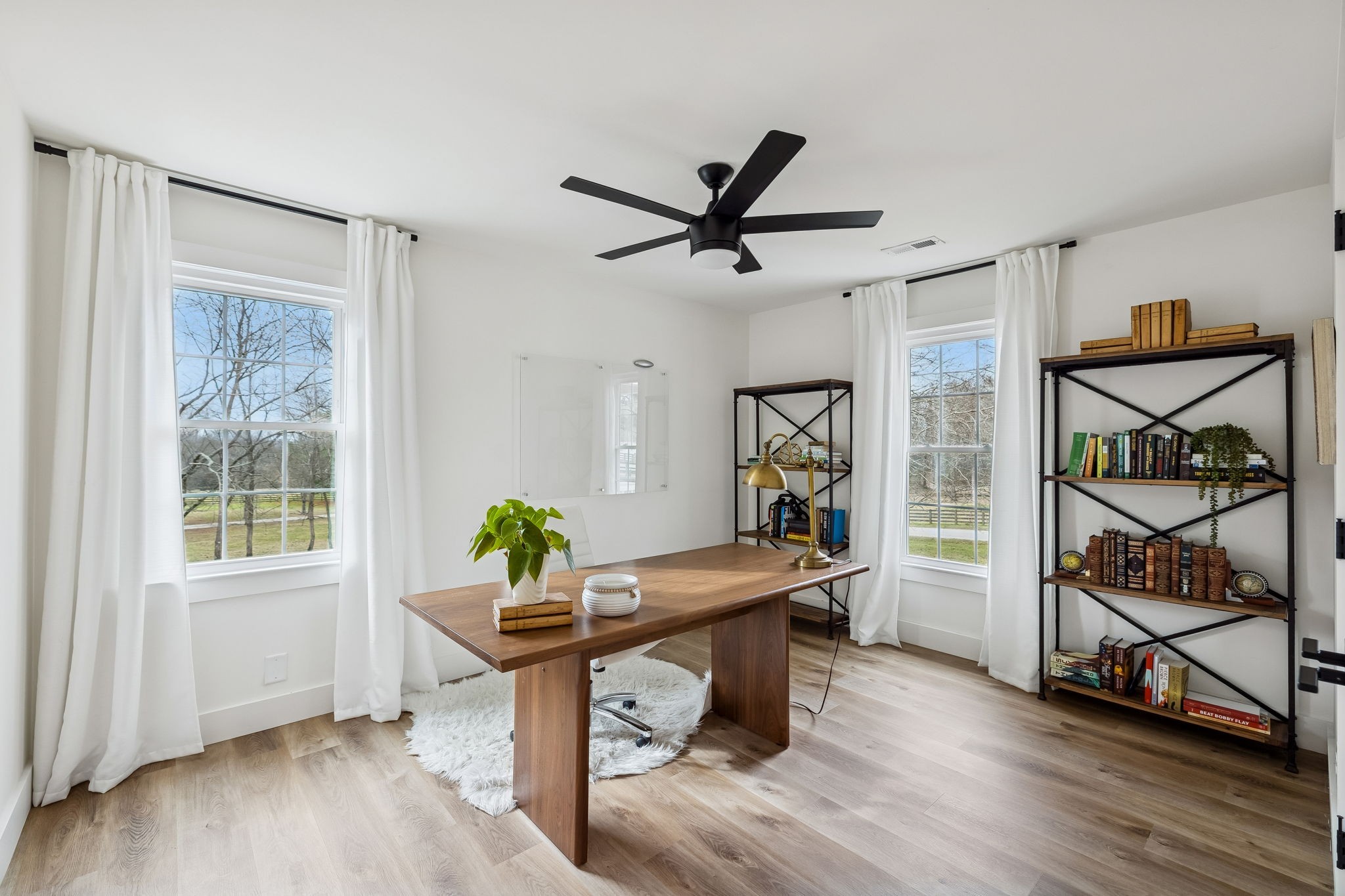 670 North Ridge Road Columbia, TN 38401 - Photo 19 of 45 a view of a workspace with furniture and a window