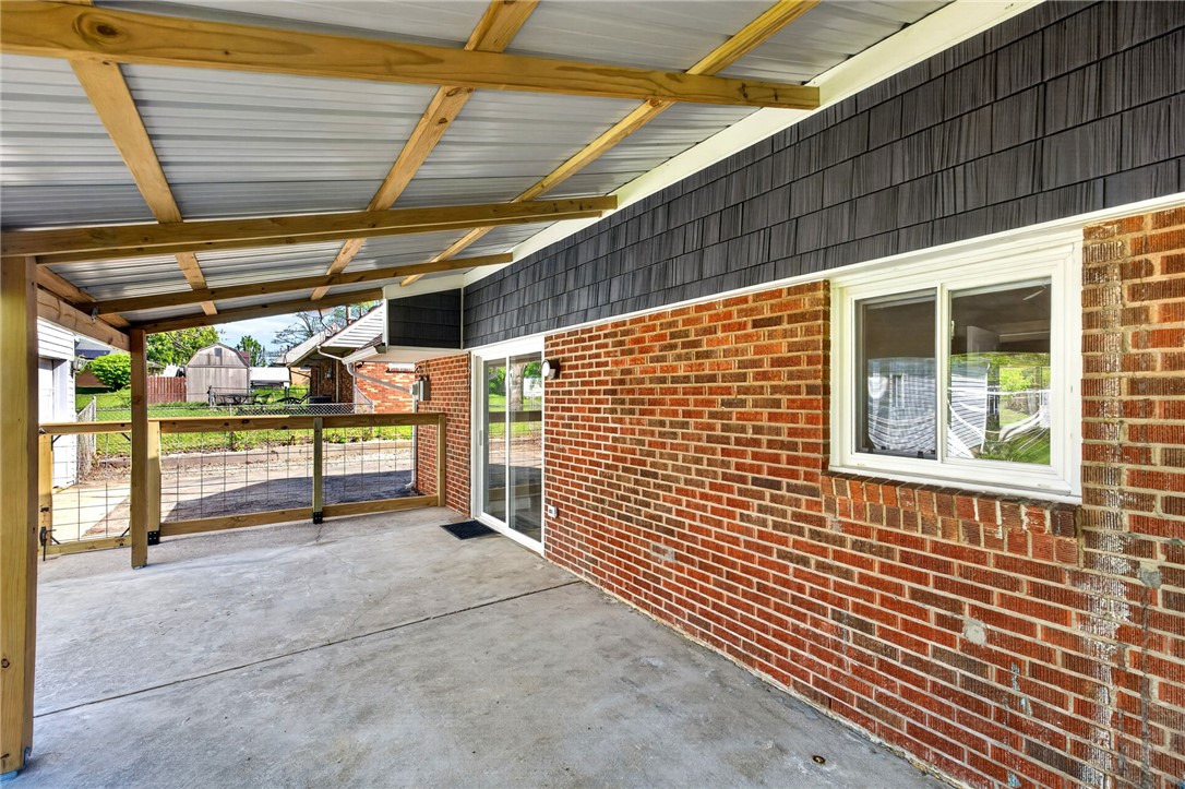 5975 Rosalie Road Dayton, OH 45424 - Photo 35 of 48 This spacious patio offers an inviting outdoor living space with durable concrete flooring.