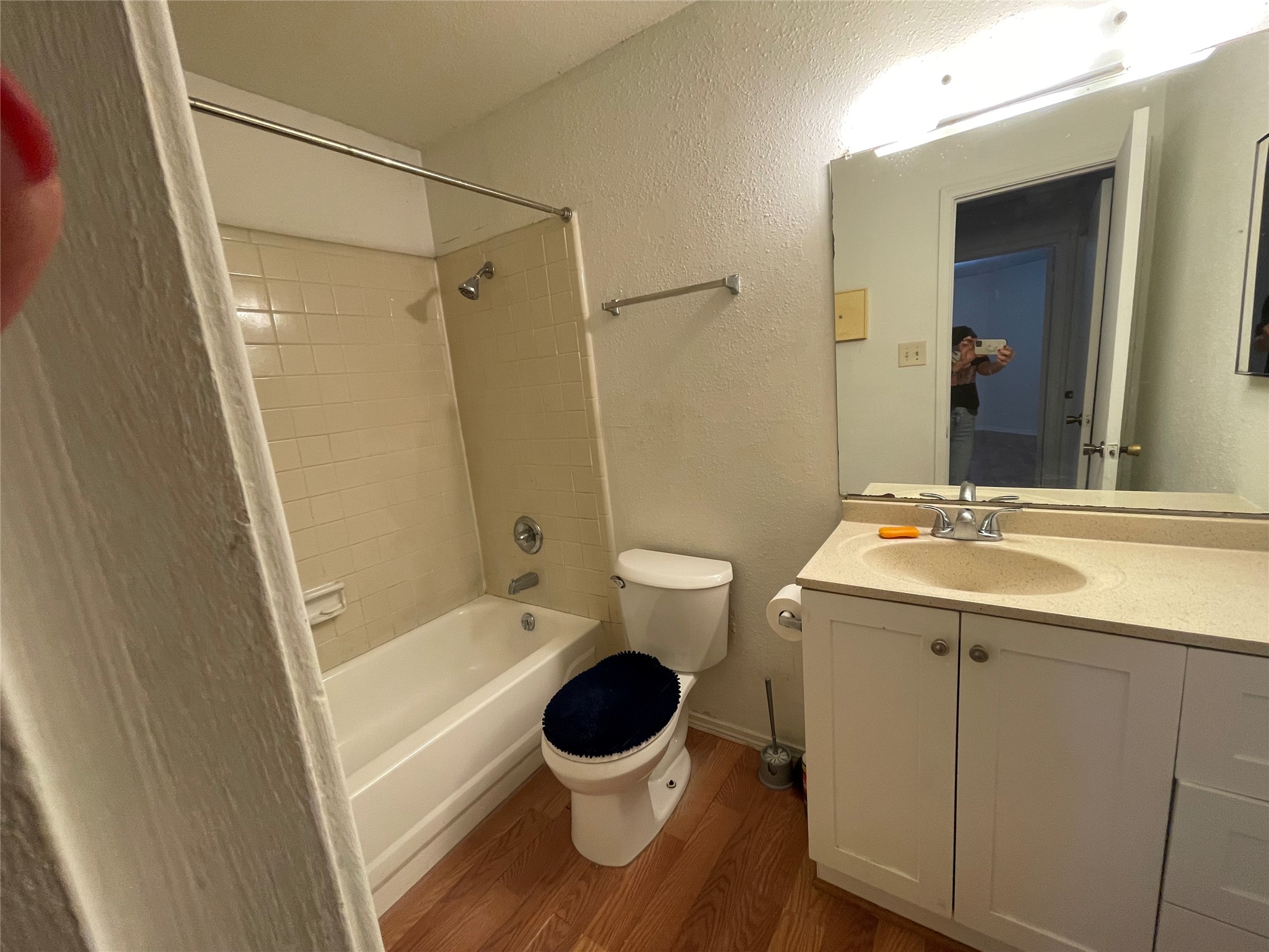 9700 Leawood Boulevard, Unit 1908 Houston, TX 77099 - Photo 5 of 7 a bathroom with a sink toilet and shower