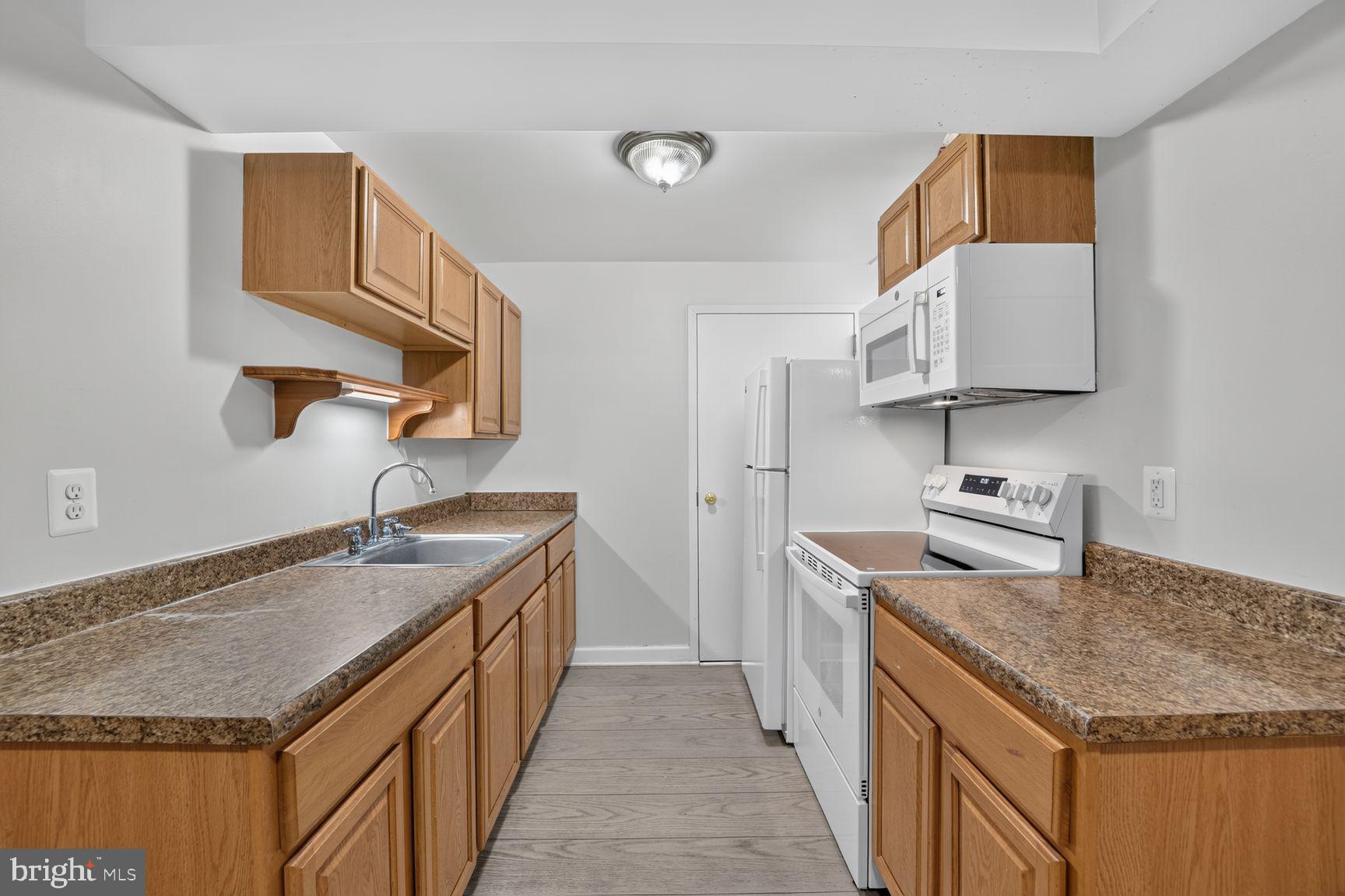 9957 Guilford Road Jessup, MD 20794 - Photo 32 of 37 Basement- 2nd Full Kitchen