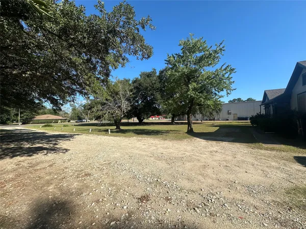 a view of swimming pool with a yard