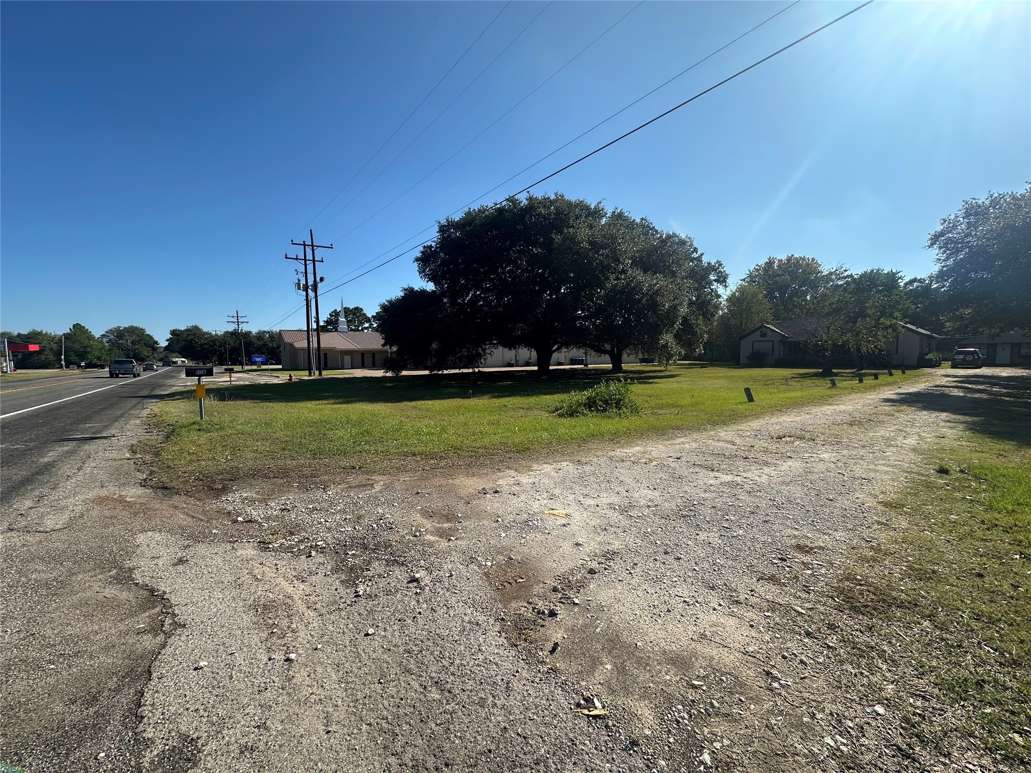 312b Prospect Drive Trinity, TX 75862 - Photo 2 of 23 a view of a golf course with a lake