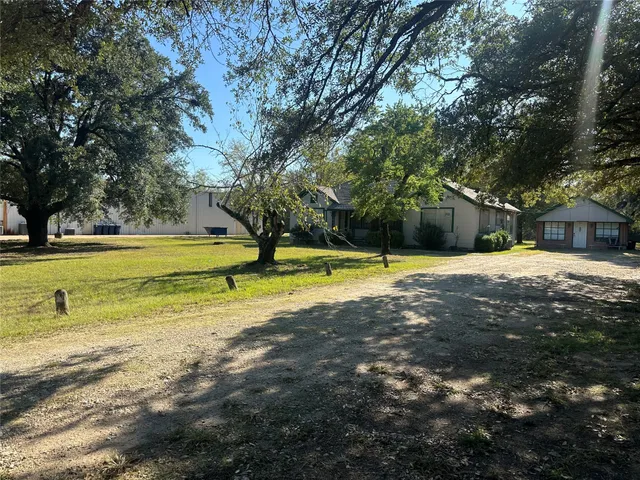 a view of a swimming pool with an outdoor space and seating area