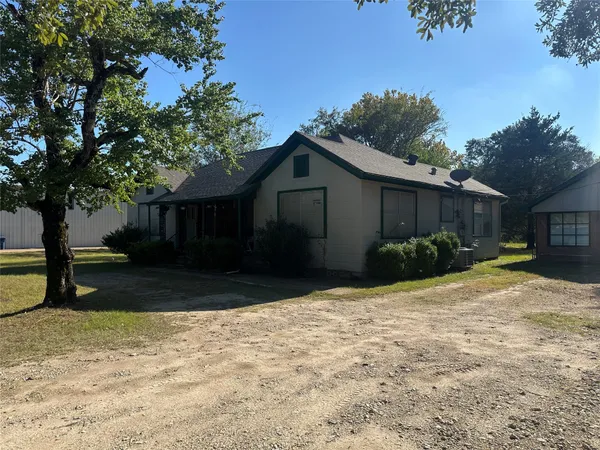 a view of backyard of house