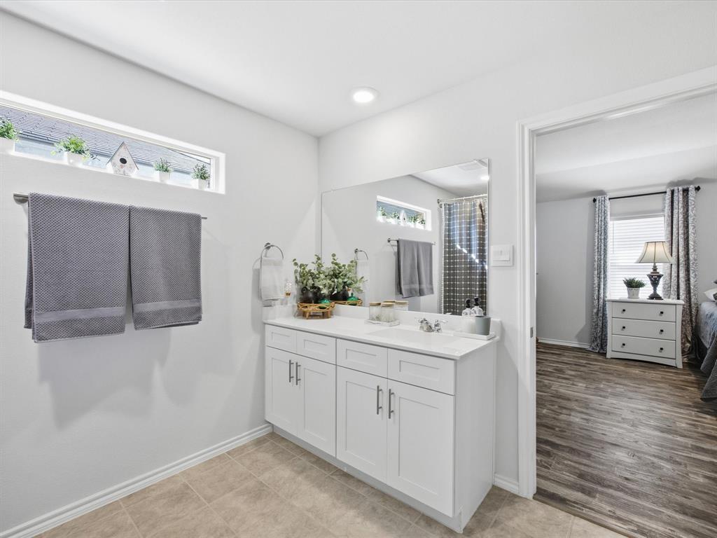 521 Bronze Circle East Springtown, TX 76082 - Photo 14 of 22 Corian counters, Handicap accessible shower and a walk in closet