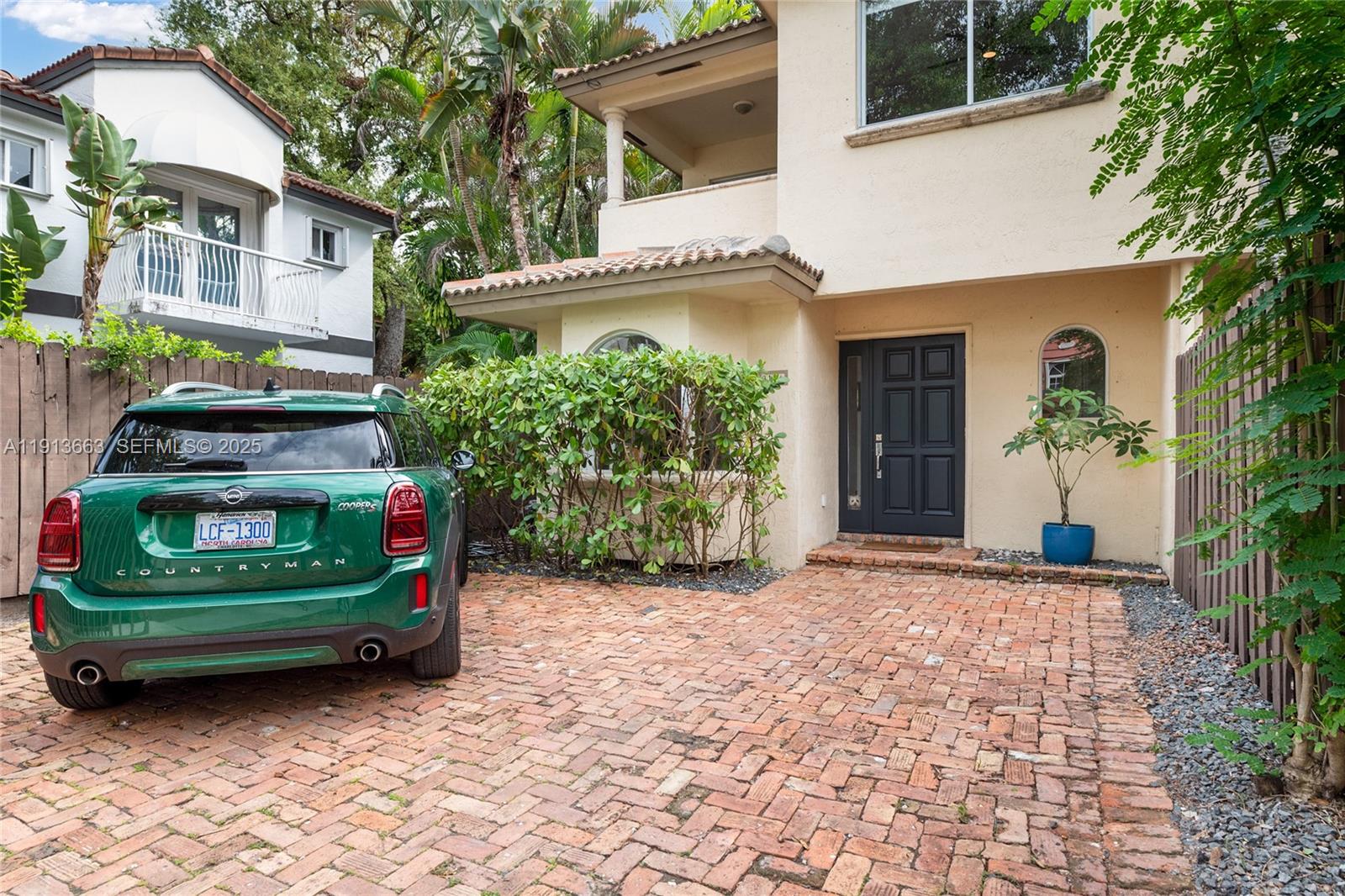 3124 Jackson Avenue, Unit 1 Miami, FL 33133 - Photo 1 of 23 a view of a house with a garden