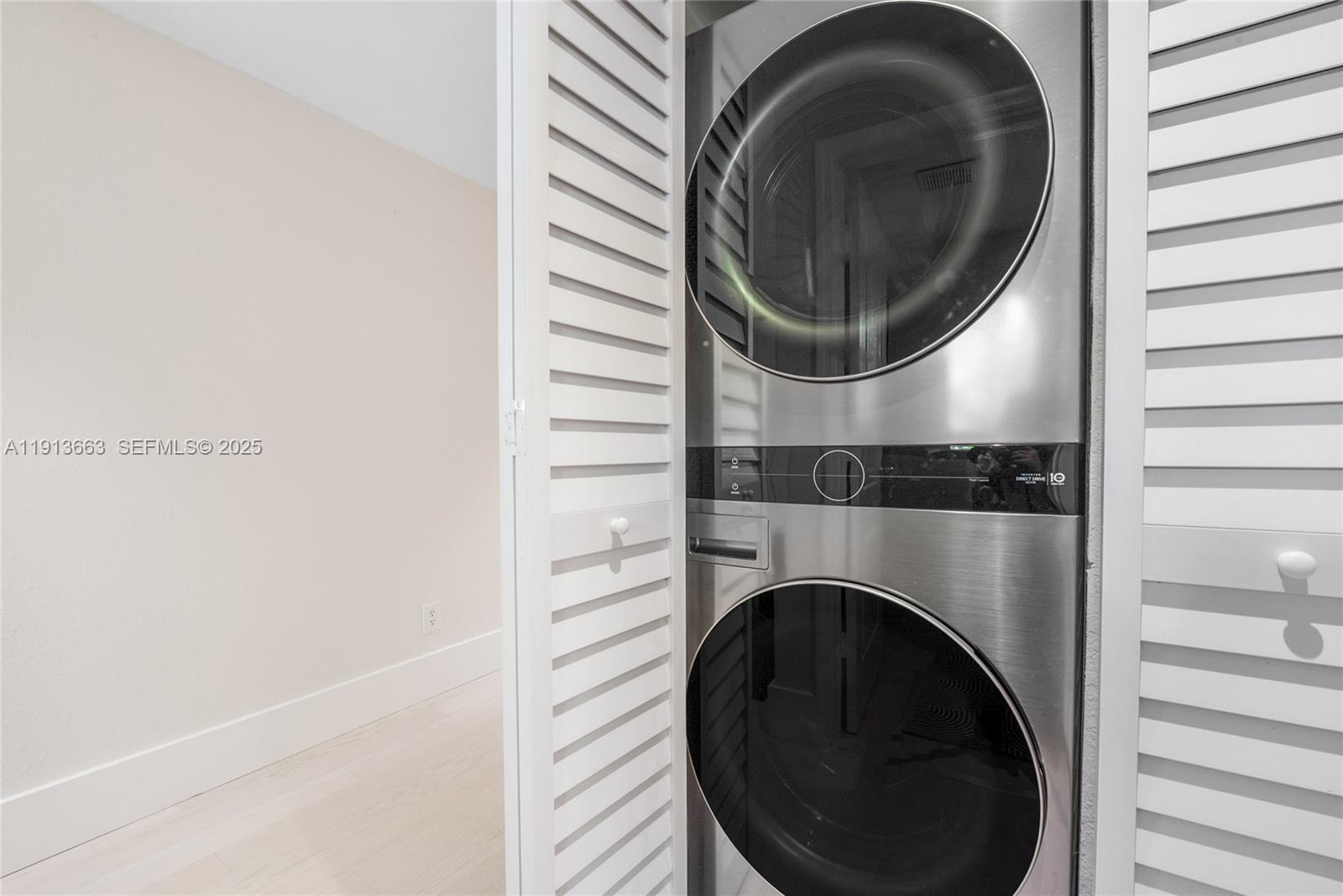 3124 Jackson Avenue, Unit 1 Miami, FL 33133 - Photo 13 of 23 a utility room with dryer and washer