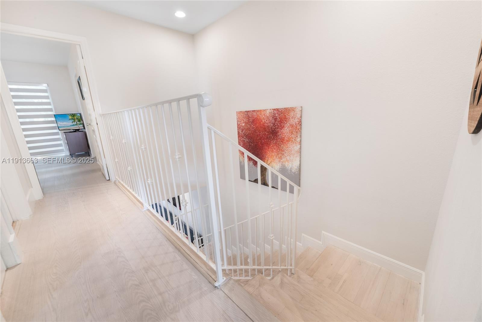3124 Jackson Avenue, Unit 1 Miami, FL 33133 - Photo 15 of 23 a view of a hallway with staircase