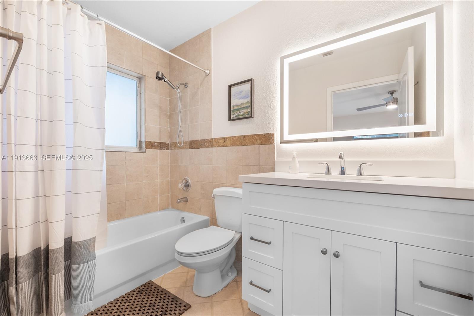 3124 Jackson Avenue, Unit 1 Miami, FL 33133 - Photo 18 of 23 a bathroom with a sink toilet and shower