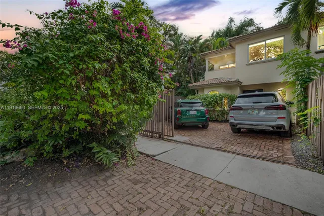 a car parked in front of a house