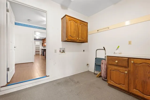 a view of a hallway with closet