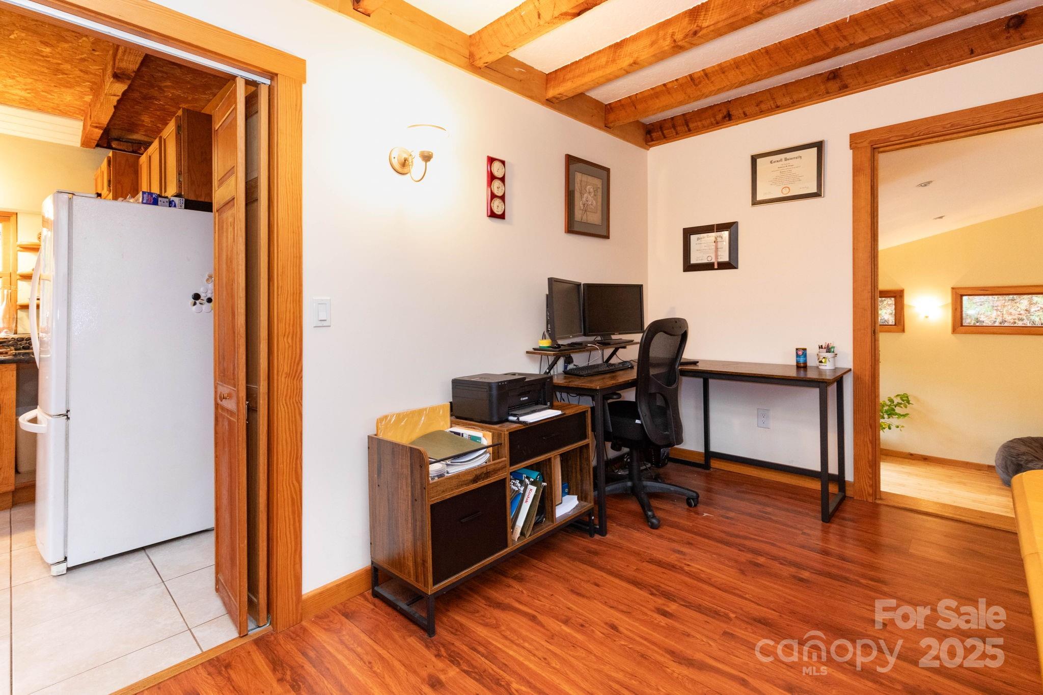 35 Norton Br Road Marshall, NC 28753 - Photo 13 of 35 a view of a workspace with furniture and wooden floor