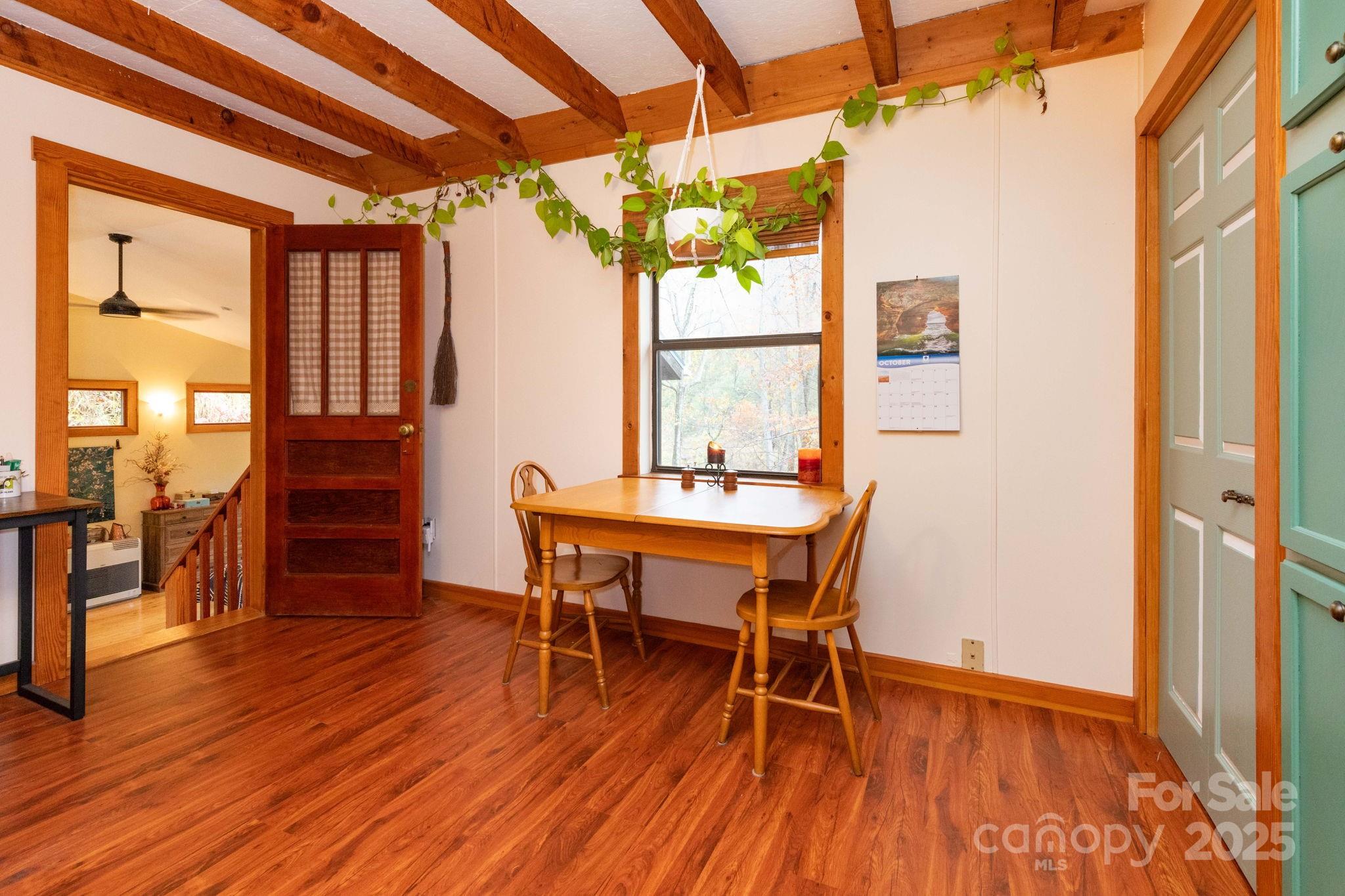 35 Norton Br Road Marshall, NC 28753 - Photo 14 of 35 a view of a dining room with furniture window and wooden floor