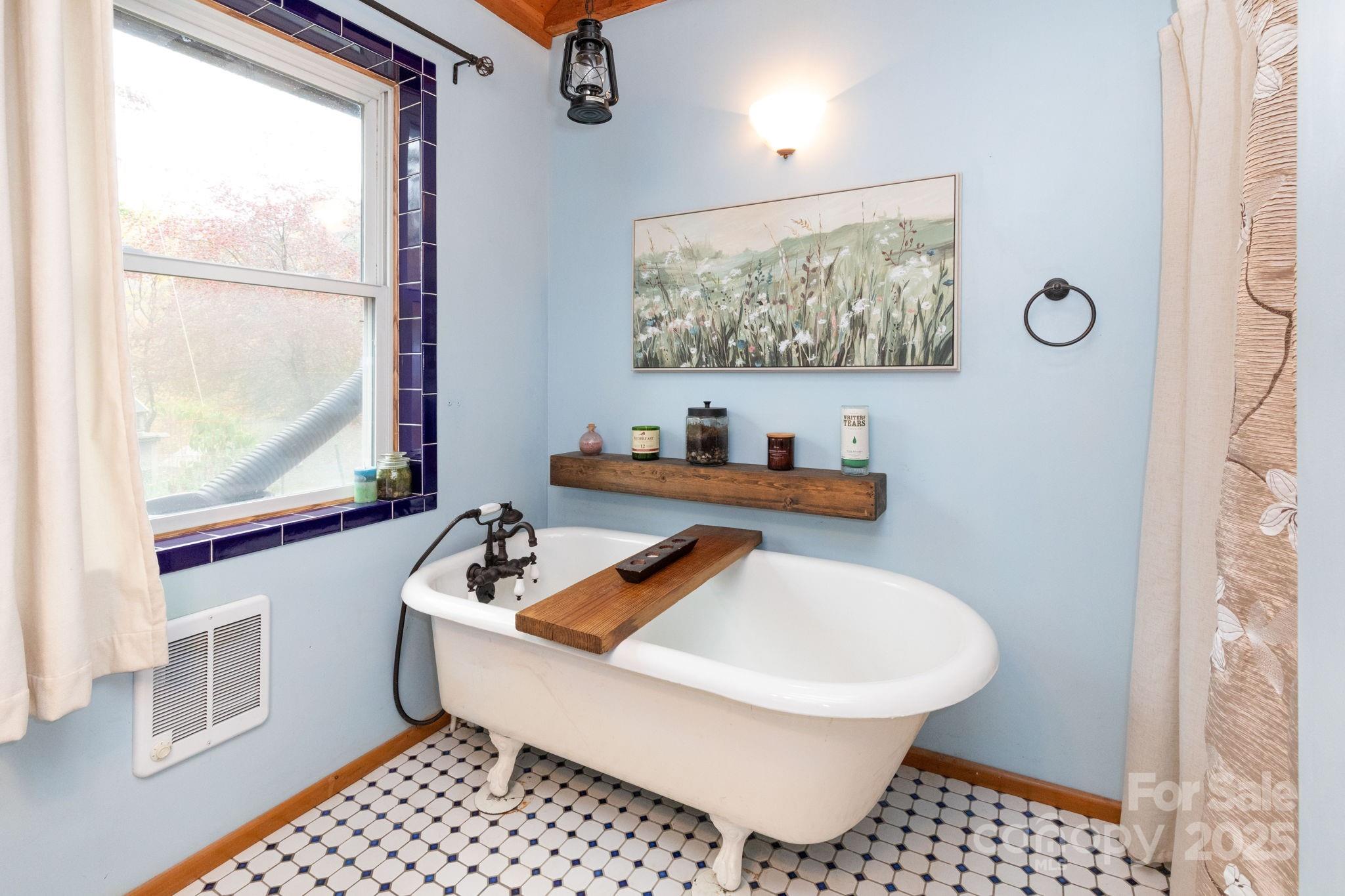 35 Norton Br Road Marshall, NC 28753 - Photo 20 of 35 a white house sitting next to a white sink