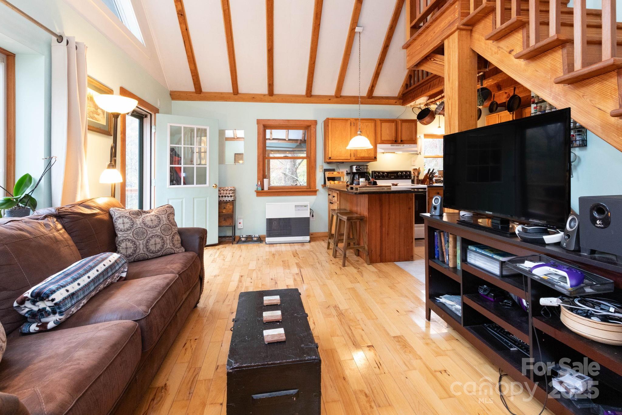 35 Norton Br Road Marshall, NC 28753 - Photo 7 of 35 a living room with furniture and a flat screen tv