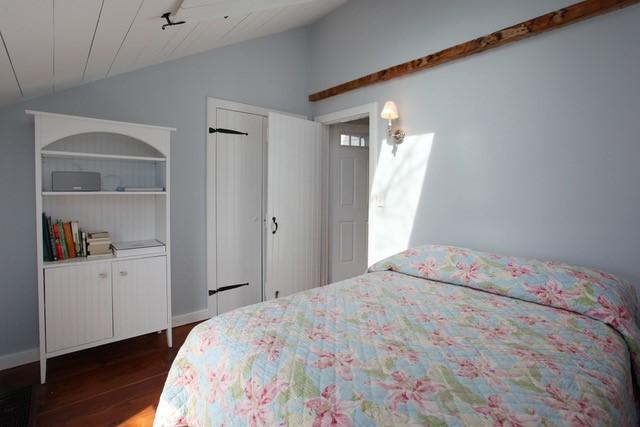 21 Milestone Way Mashpee, MA 02649 - Photo 13 of 27 a bedroom with a bed and a window
