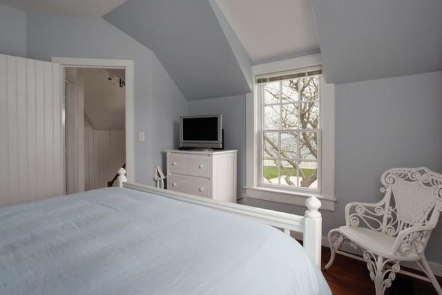 21 Milestone Way Mashpee, MA 02649 - Photo 20 of 27 a bedroom with a bed and a window