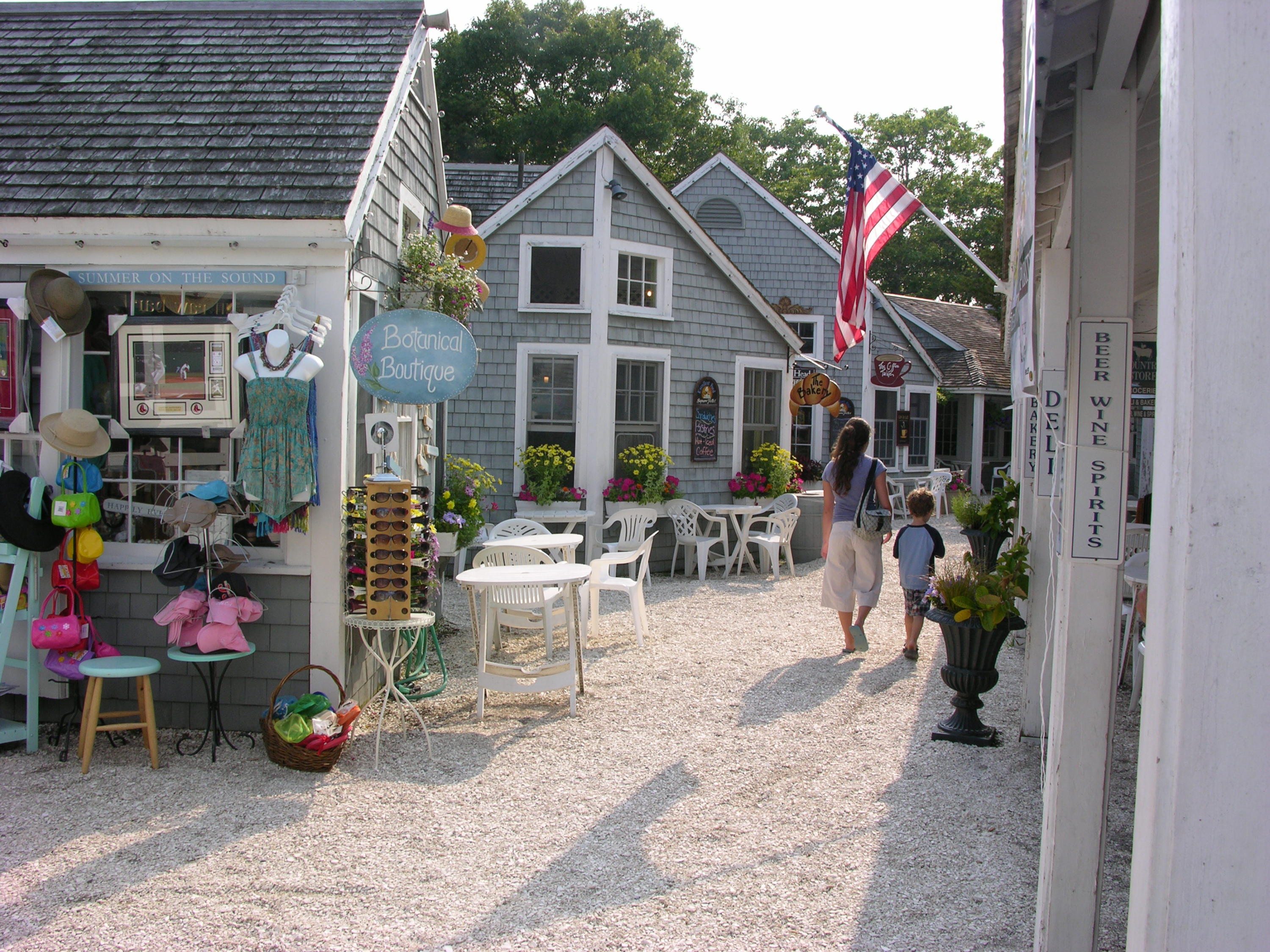 21 Milestone Way Mashpee, MA 02649 - Photo 26 of 27 a view of a dinning tables and chairs in a patio