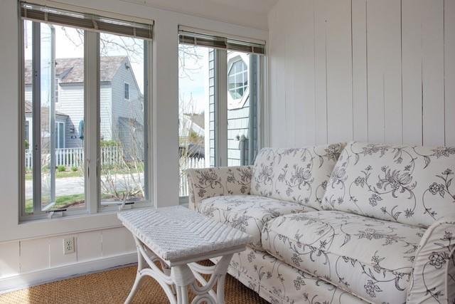 21 Milestone Way Mashpee, MA 02649 - Photo 7 of 27 a living room with couches and a large window with outer view