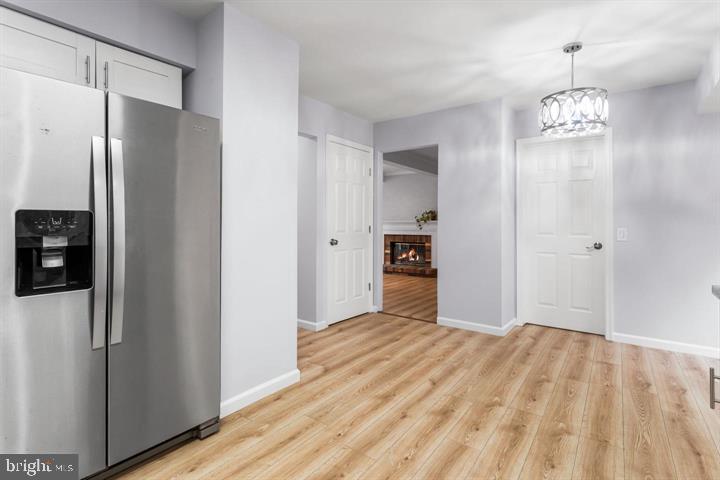 2807 Falling Brook Terrace Hyattsville, MD 20783 - Photo 12 of 48 a view of kitchen space with wooden floor