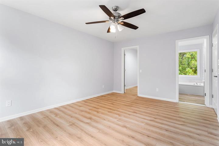 2807 Falling Brook Terrace Hyattsville, MD 20783 - Photo 22 of 48 a view of a big room with wooden floor and windows