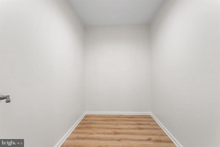 2807 Falling Brook Terrace Hyattsville, MD 20783 - Photo 25 of 48 a view of a room with wooden floor