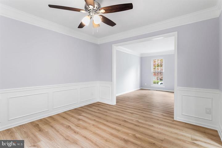 2807 Falling Brook Terrace Hyattsville, MD 20783 - Photo 9 of 48 wooden floor in an empty room with a window