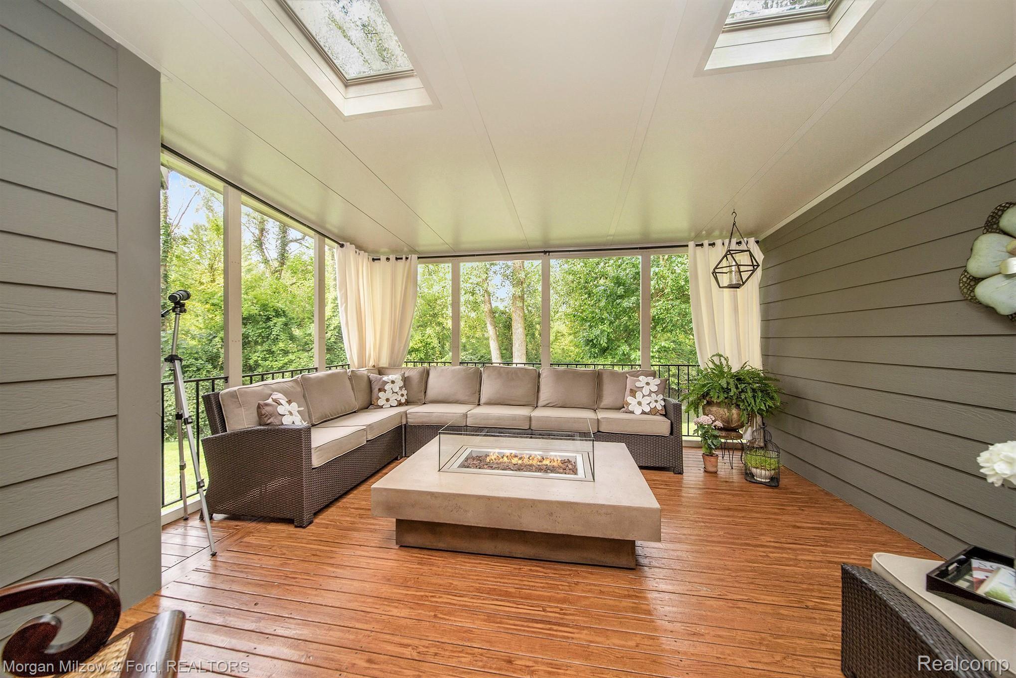 6602 Steeple Ridge Clarkston, MI 48346 - Photo 17 of 38 One-of-a-kind screened in porch