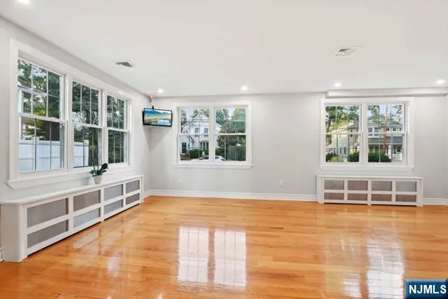 a view of empty room with large window