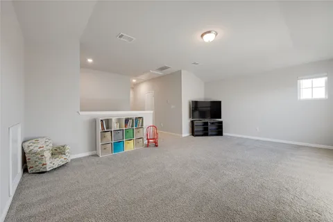 a view of a livingroom with furniture