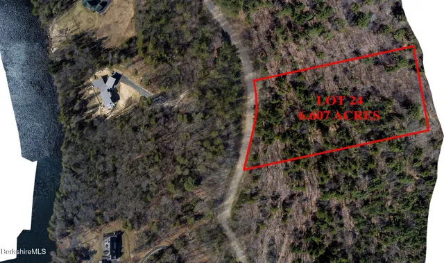 a view of a lake with mountain