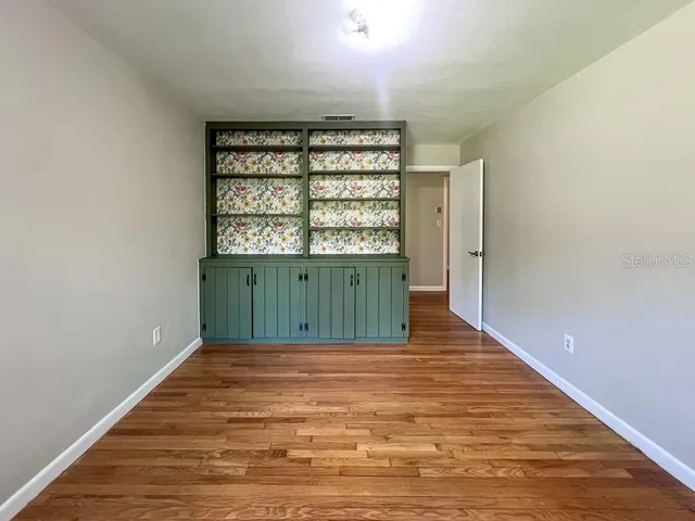 a view of entryway with wooden floor