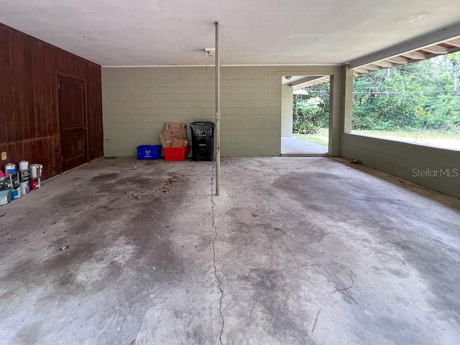 3706 Southwest 2 Place Gainesville, FL 32607 - Photo 24 of 25 a view of a room with a window and storage