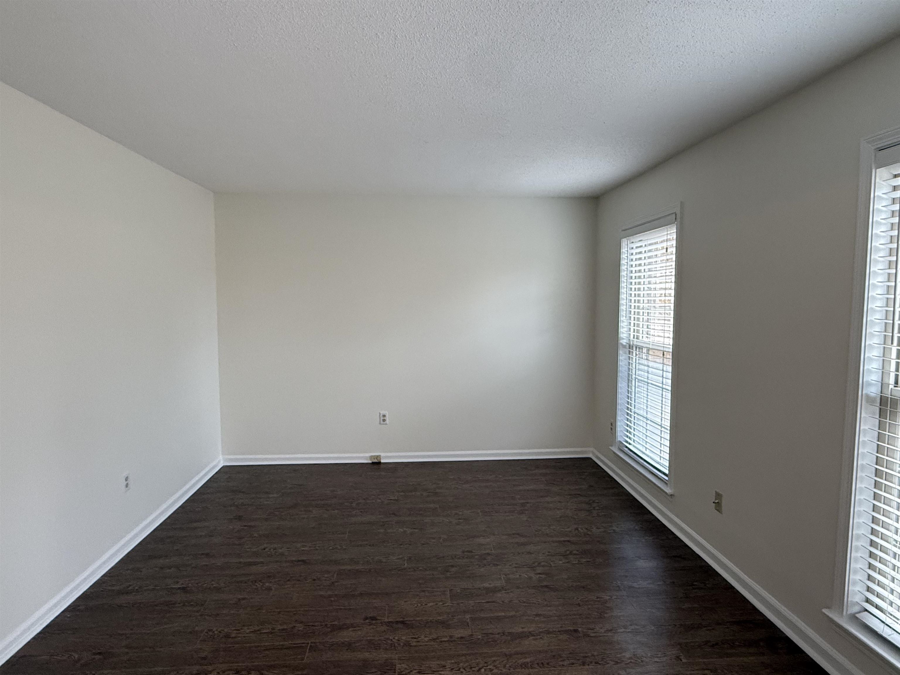 2639 Cedar Ridge Drive Germantown, TN 38138 - Photo 4 of 17 an empty room with wooden floor and windows