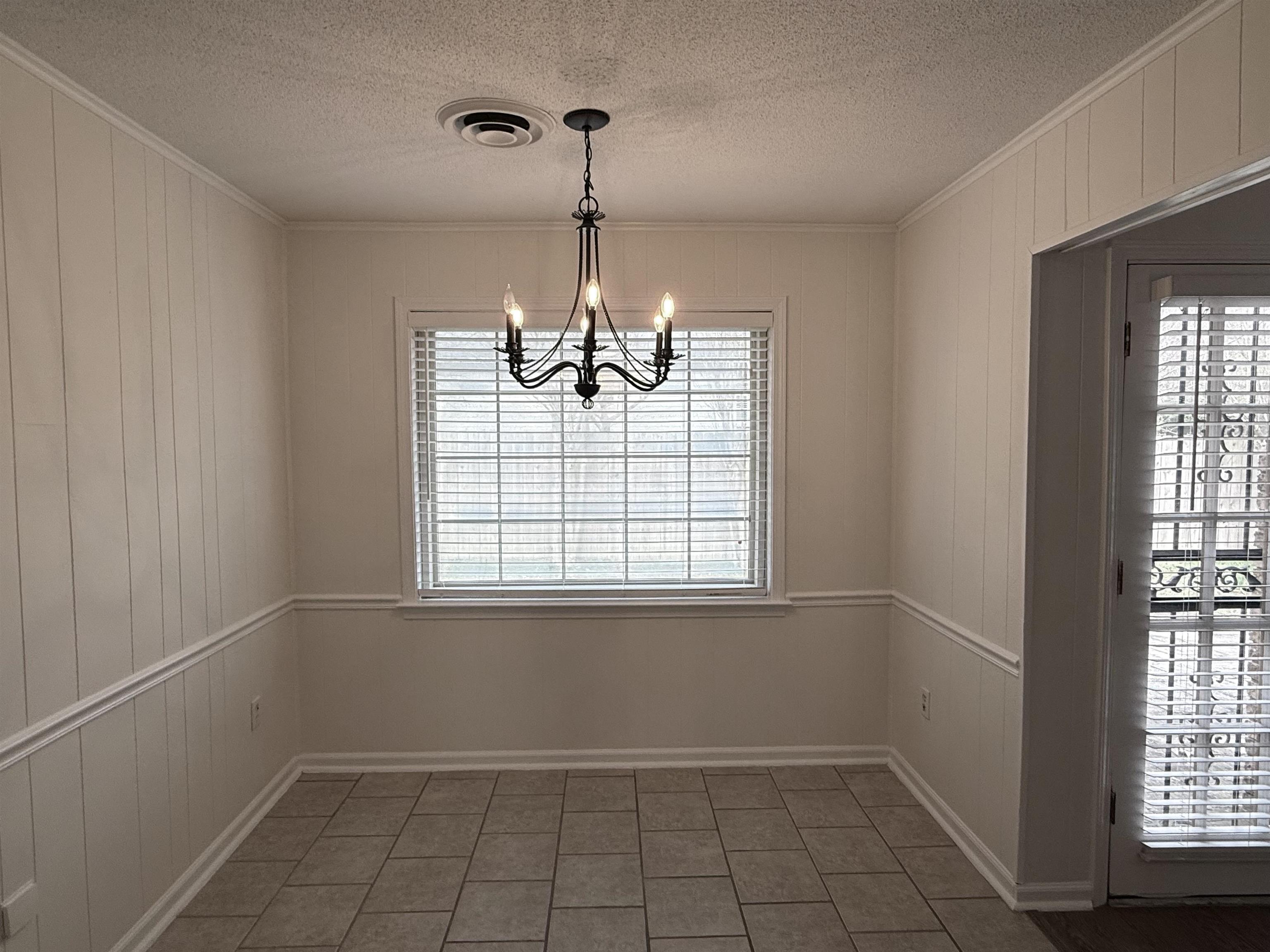 2639 Cedar Ridge Drive Germantown, TN 38138 - Photo 7 of 17 a view of an empty room with a window