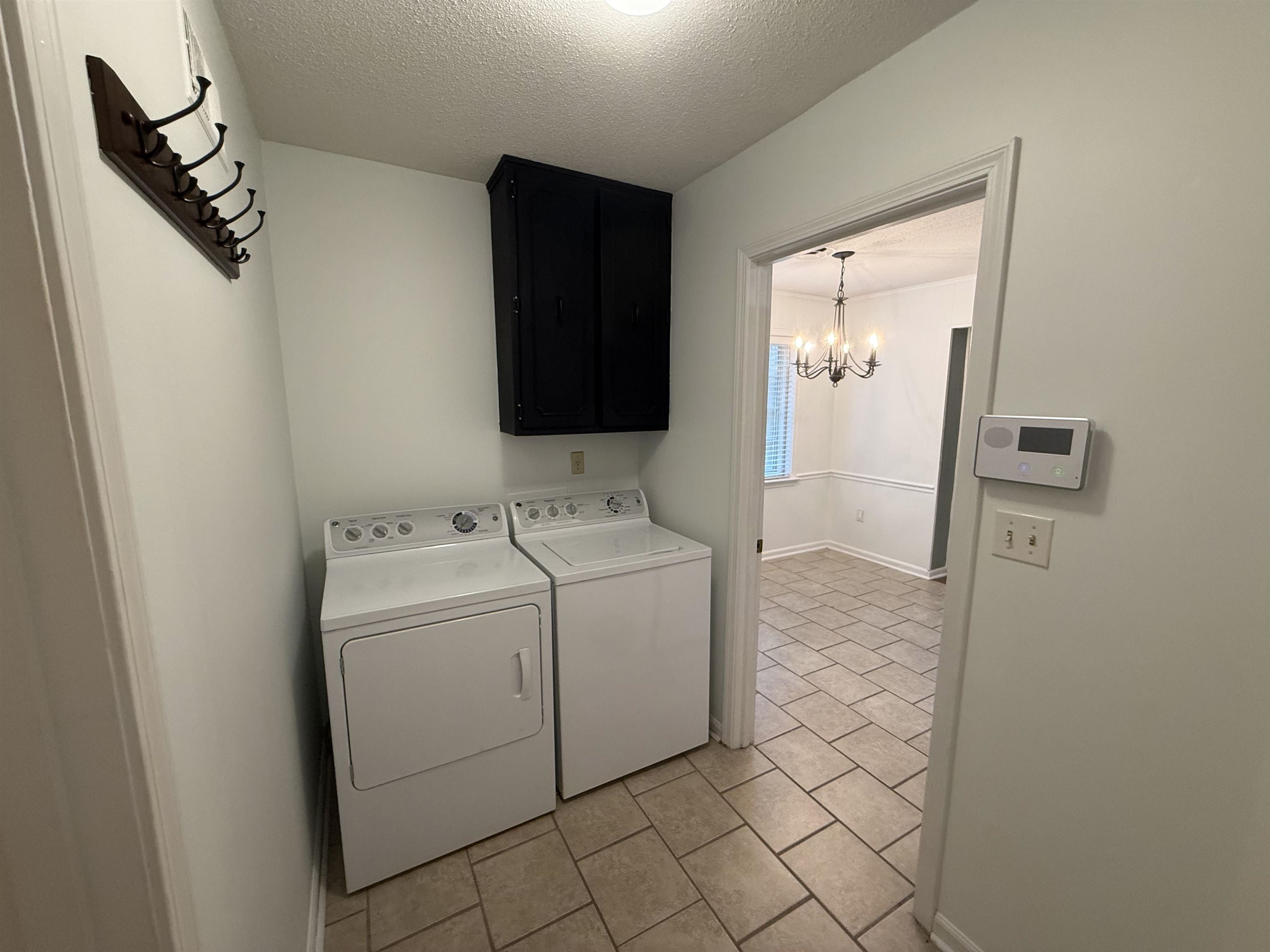 2639 Cedar Ridge Drive Germantown, TN 38138 - Photo 8 of 17 a utility room with dryer and washer