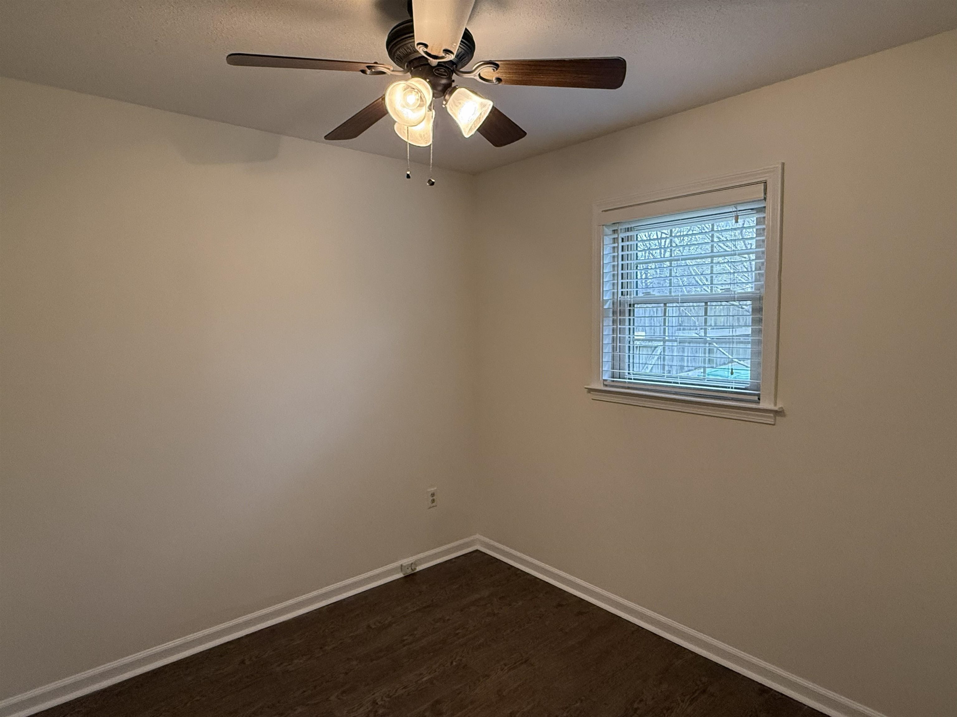 2639 Cedar Ridge Drive Germantown, TN 38138 - Photo 9 of 17 an empty room with a window and a fan