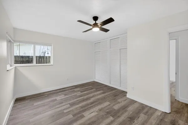 a bathroom with a sink toilet and mirror