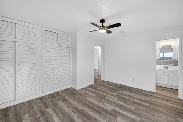 a bathroom with a shower and toilet