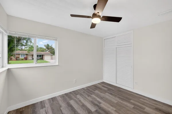 a bathroom with a sink vanity and mirror
