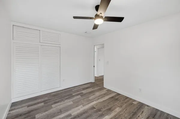 a bathroom with a bathtub and a toilet