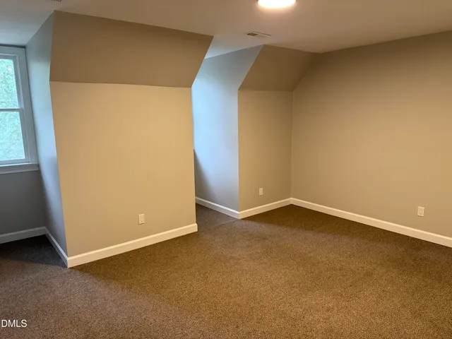 an empty room with a natural light