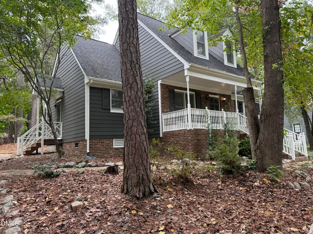 a backyard of a house with lots of green space